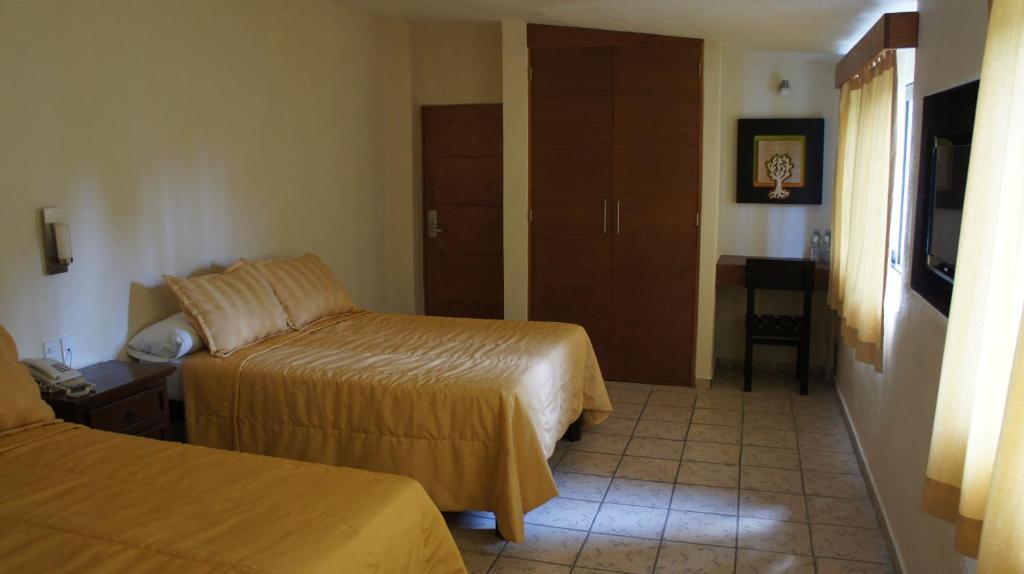 Coral Pacifico Hotel Y Villas 曼萨尼约 客房 照片