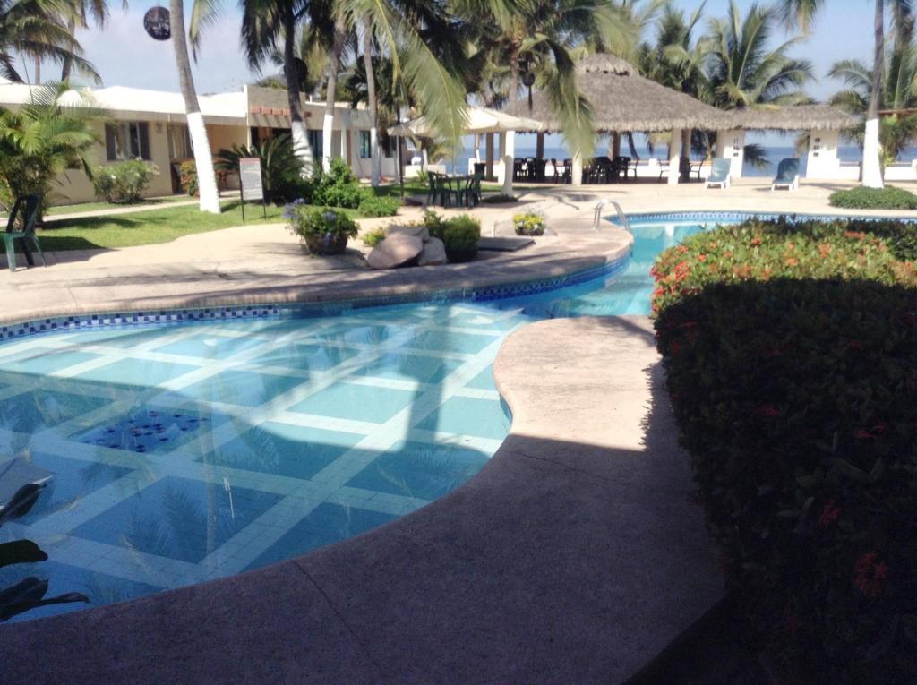 Coral Pacifico Hotel Y Villas 曼萨尼约 外观 照片