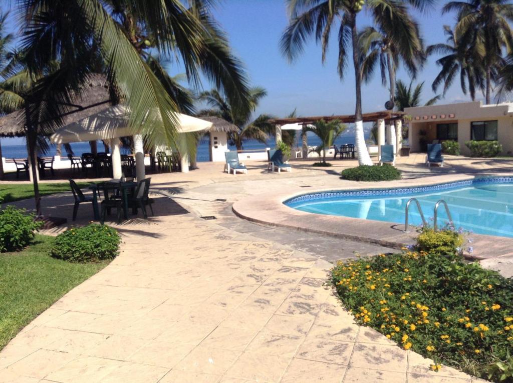 Coral Pacifico Hotel Y Villas 曼萨尼约 外观 照片